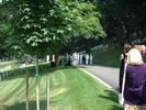 16-casket halts near grave